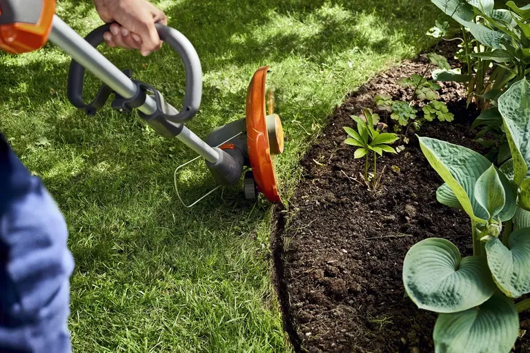 Gresstrimmer Husqvarna 110iL m/batteri og lader